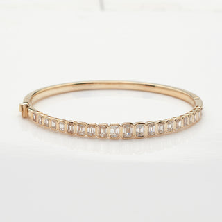 14KY 3.00CTW EMERALD DIAMOND BEZEL SET GRADUATED